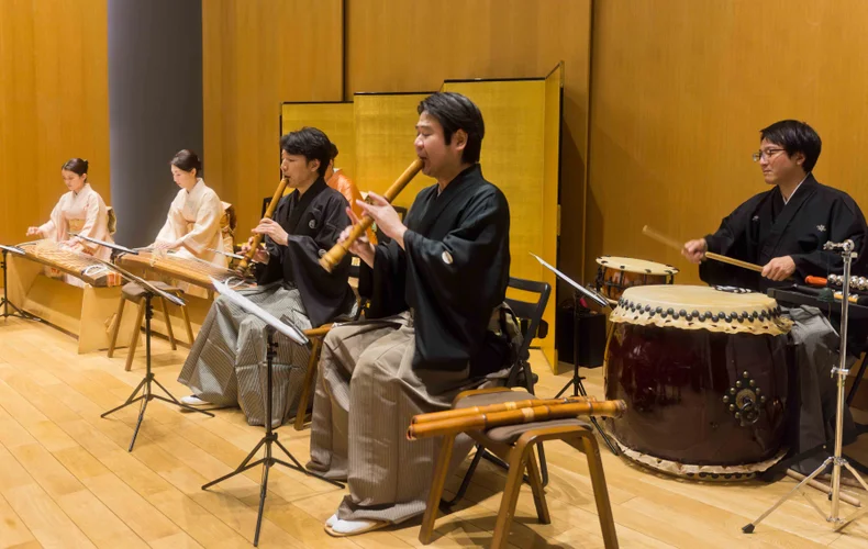 A Japanese ensemble performing with two koto, two shakuhachi and a taiko drum
